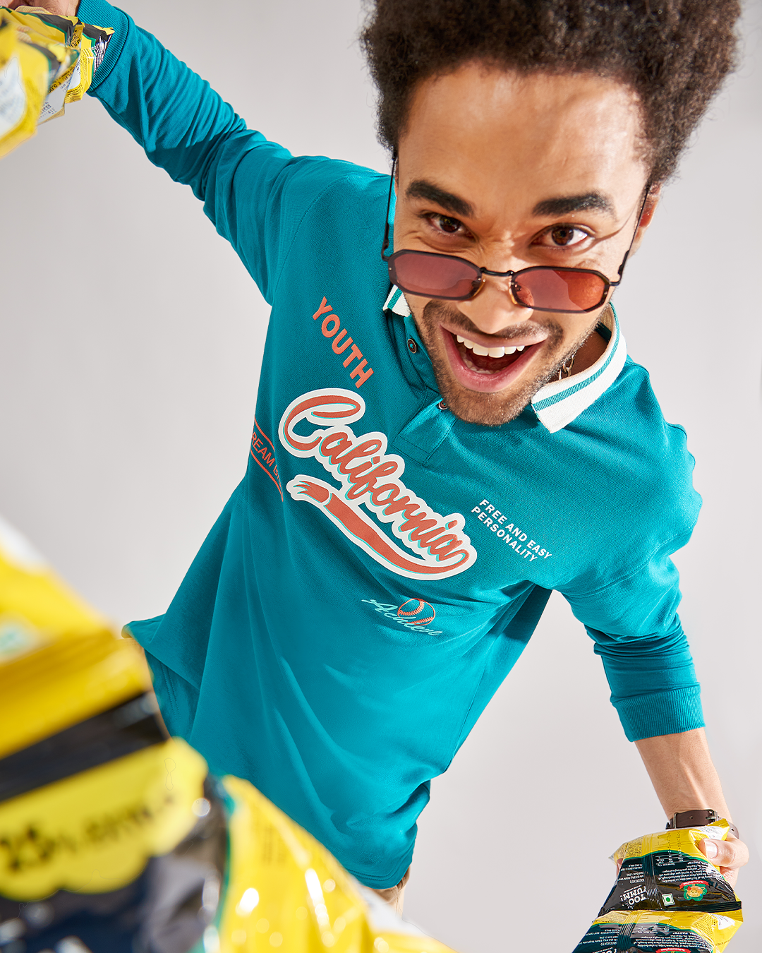 Branding identity visual showing a vibrant fashion model in casual wear, highlighting branding and brand identity through bold styling