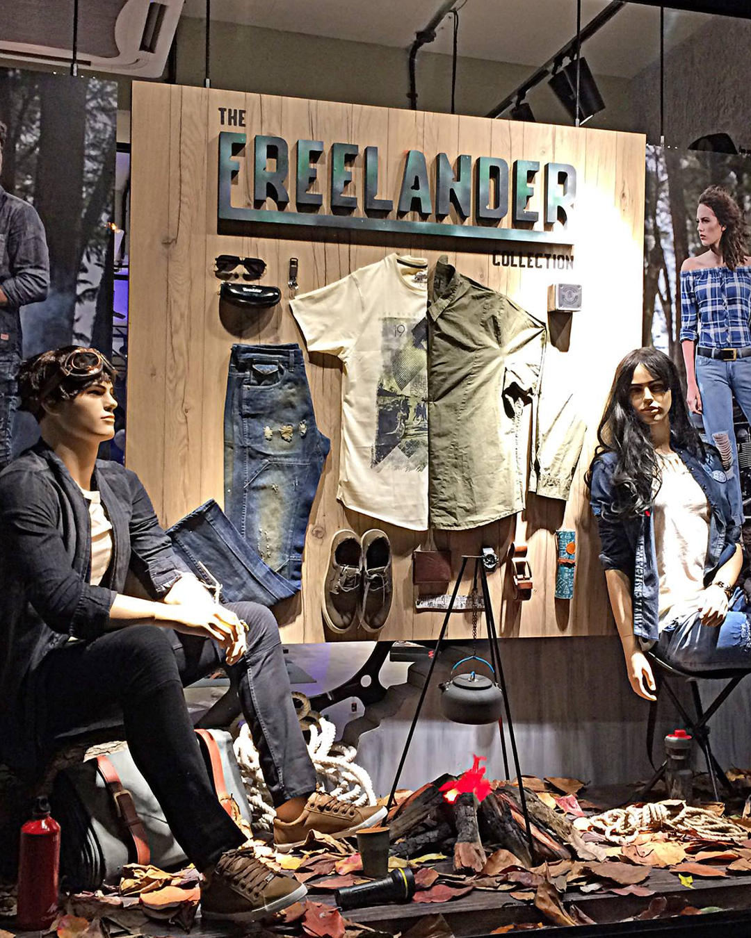 Outdoor-inspired Freelander merchandising and display showcasing apparel and mannequins to highlight the visual merchandising strategy.