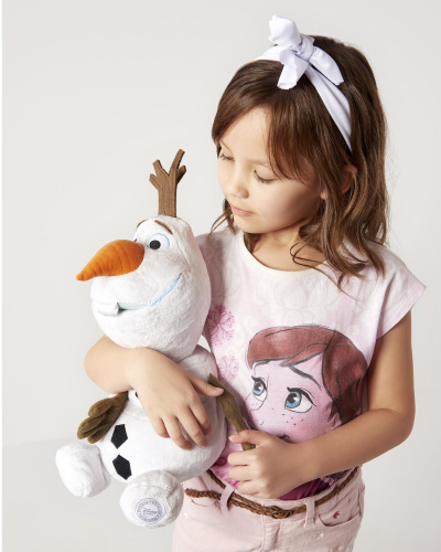 Young girl holding an Olaf plush toy, wearing a Disney & Me character T-shirt from a kidswear collection designed by JUMPINGGOOSE.