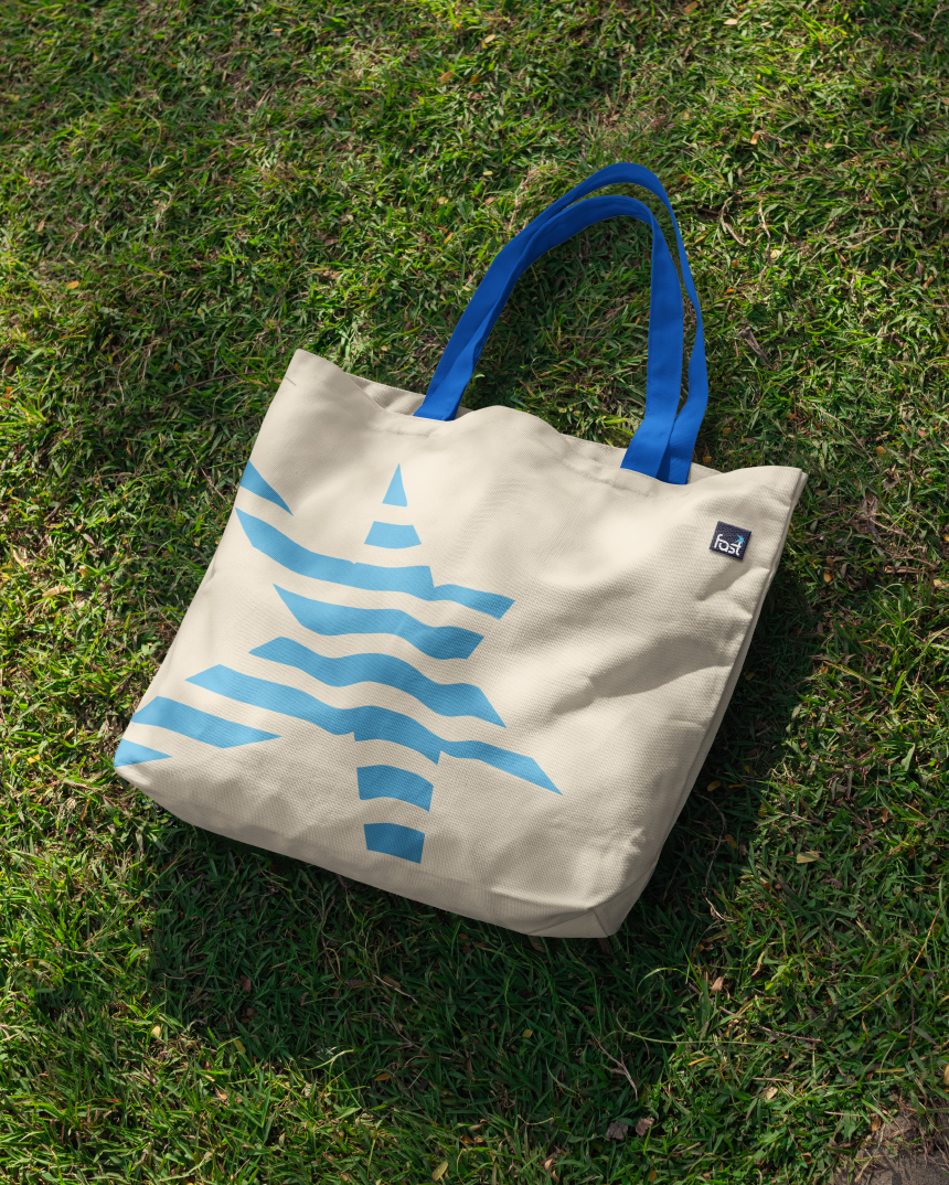 Fast Coffee merchandise design showing branded tote bag with visual identity system