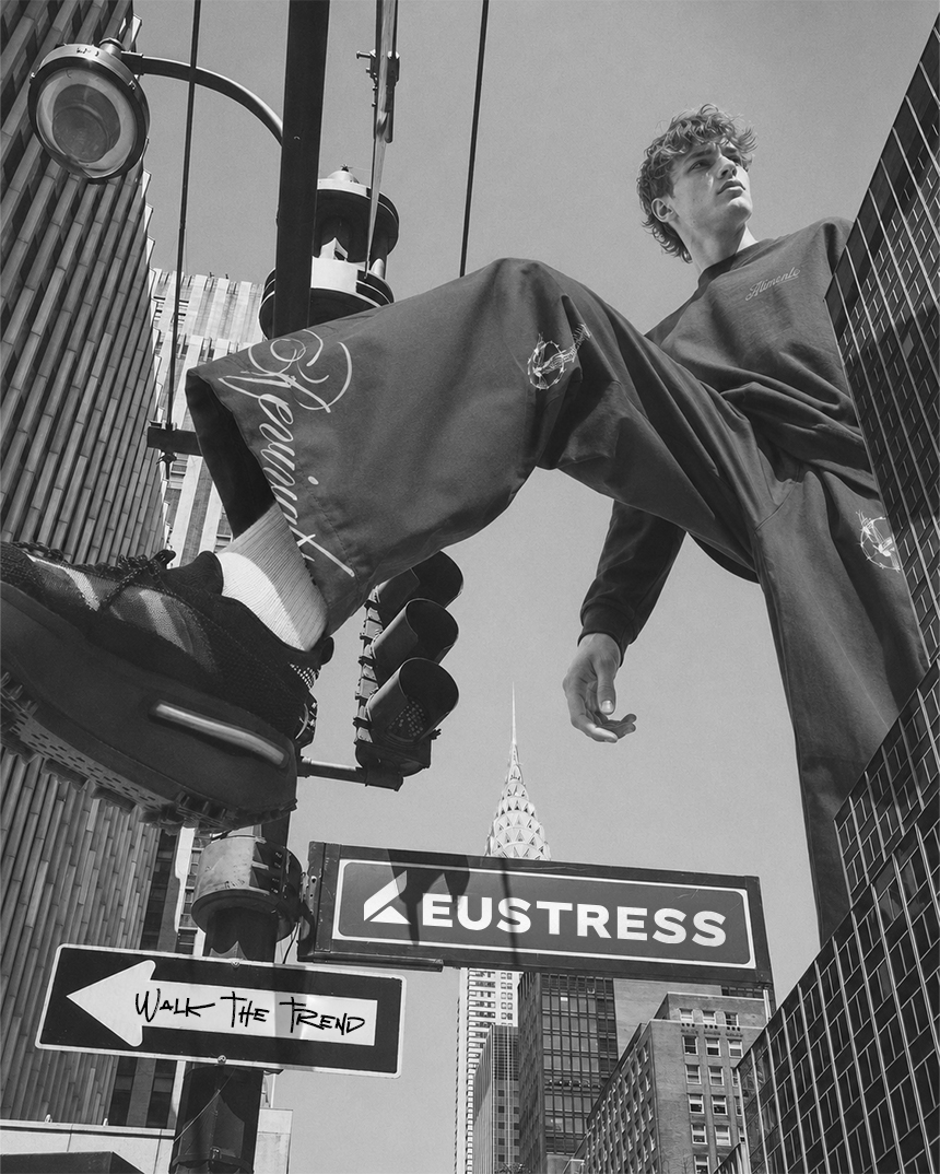 Eustress streetwear trend forecasting visual showing urban apparel styling and brand graphics