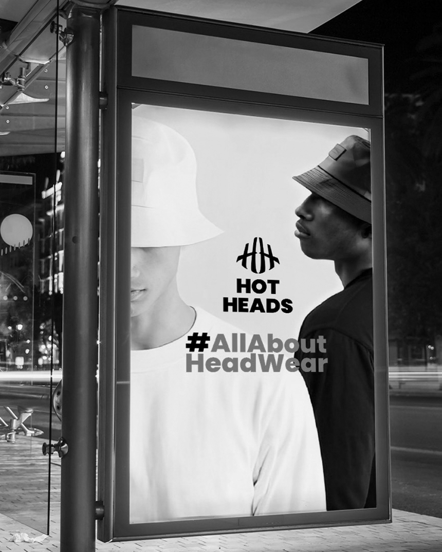 HotHeads outdoor campaign poster showing headwear branding and visual identity
